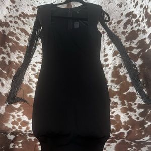 New with tags Western style dress Zipper back Black fringe sleeves. Knee length
